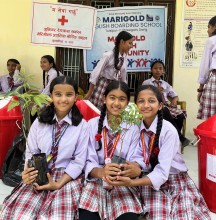 मेरीगोल्ड जुनियर रेडक्रस सर्कलद्वारा वृक्षारोपण र डस्टबिन वितरण